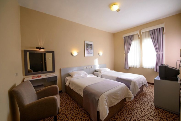 Imagen de la habitación del Hotel Herakles Thermal. Foto 12