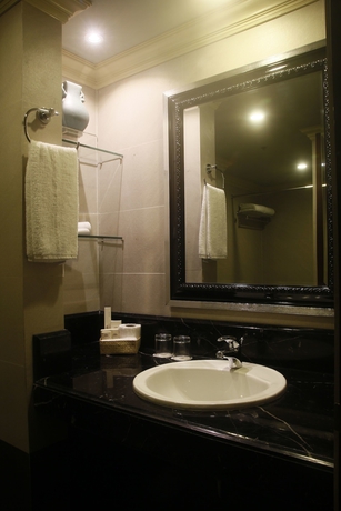 Imagen de la habitación del Hotel Herald Suites Polaris. Foto 7