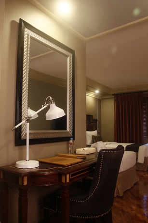 Imagen de la habitación del Hotel Herald Suites Polaris. Foto 12