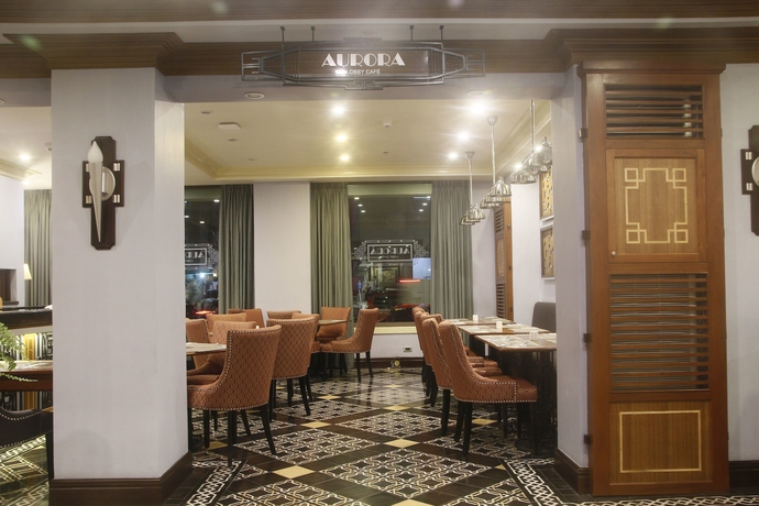 Imagen del bar/restaurante del Hotel Herald Suites Polaris. Foto 3