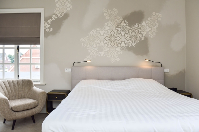 Imagen de la habitación del Hotel Herberg de Zwaan. Foto 10