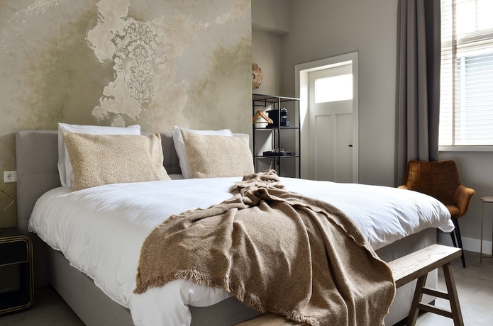 Imagen de la habitación del Hotel Herberg de Zwaan. Foto 12