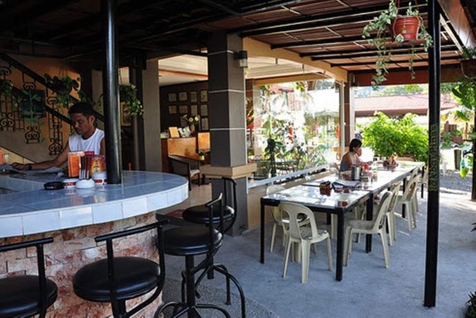Imagen del bar/restaurante del Hotel Herbies Mansion. Foto 5