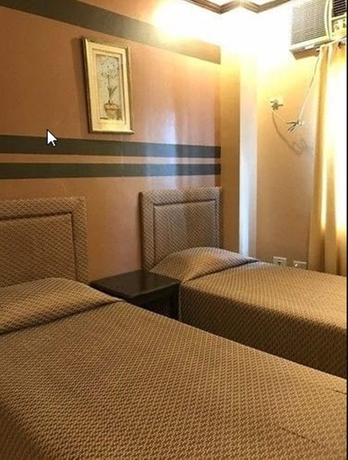 Imagen de la habitación del Hotel Herbies Mansion. Foto 8