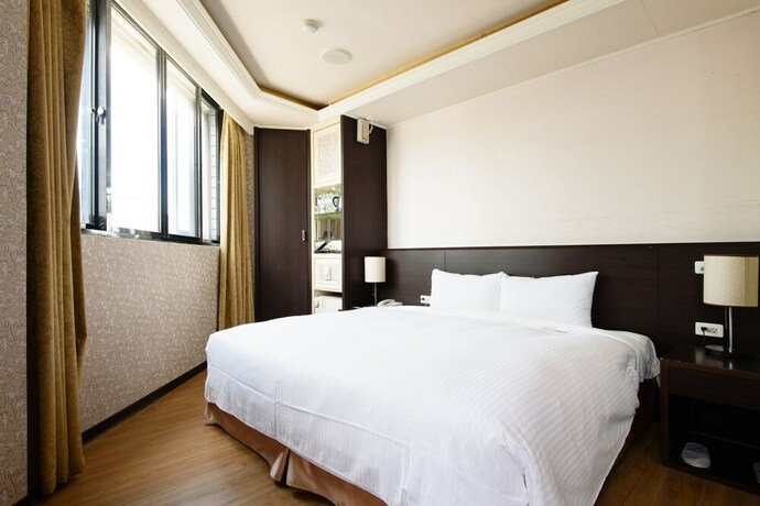 Imagen de la habitación del Hotel Herhuan. Foto 7