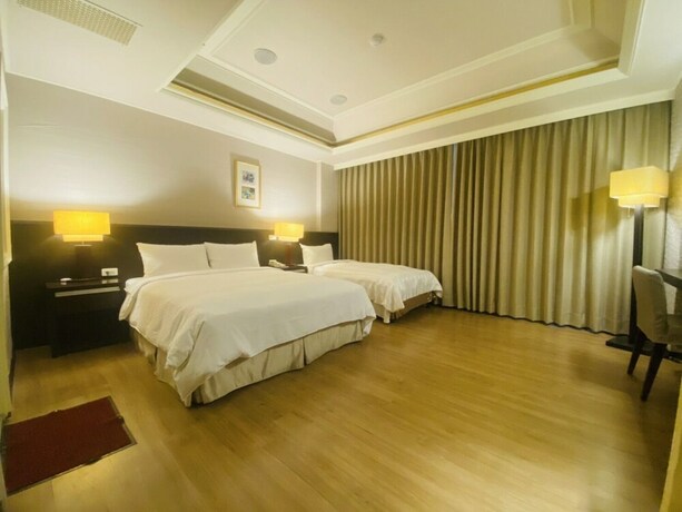 Imagen de la habitación del Hotel Herhuan. Foto 9