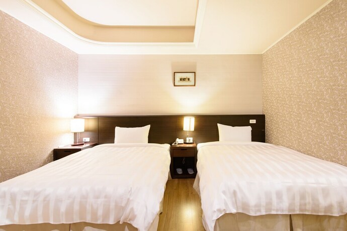 Imagen de la habitación del Hotel Herhuan. Foto 10