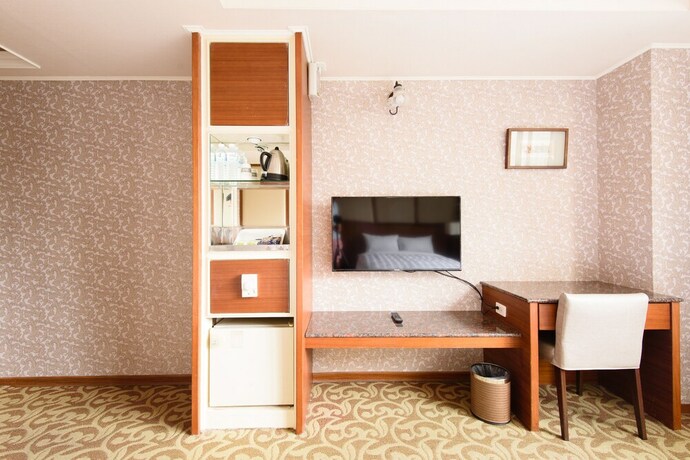 Imagen de la habitación del Hotel Herhuan. Foto 11