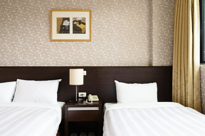 Imagen de la habitación del Hotel Herhuan. Foto 12