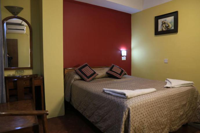 Imagen de la habitación del Hotel Heritage Home. Foto 7