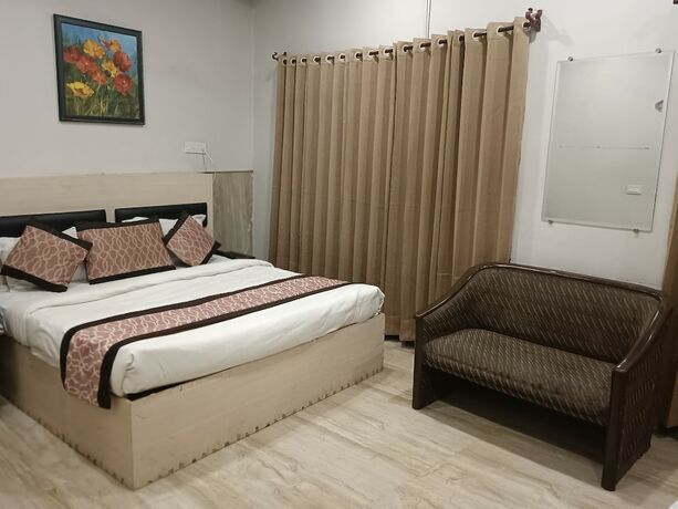 Imagen de la habitación del Hotel Heritage Homes. Foto 18