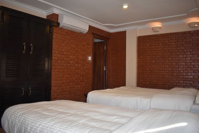 Imagen de la habitación del Hotel Heritage Malla. Foto 17