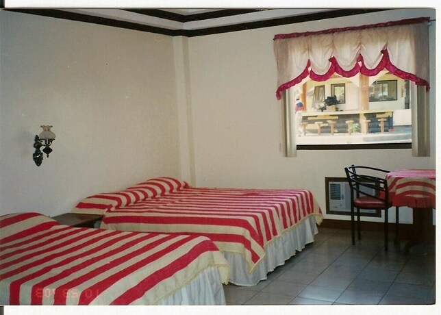 Imagen de la habitación del Hotel Heritage Resort Of Caoayan. Foto 12