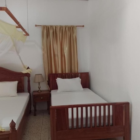 Imagen de la habitación del Hotel Heritage Retreat Bungalows. Foto 10