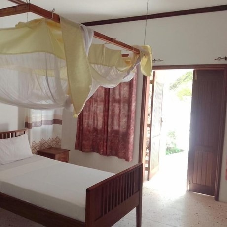 Imagen de la habitación del Hotel Heritage Retreat Bungalows. Foto 15