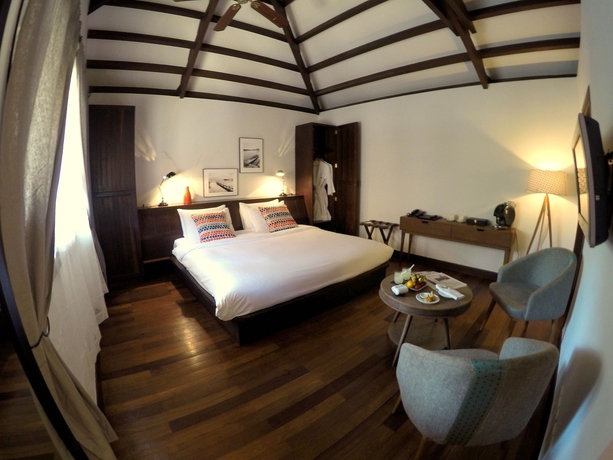 Imagen de la habitación del Hotel Heritage Suites. Foto 10