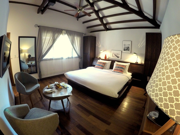 Imagen de la habitación del Hotel Heritage Suites. Foto 11