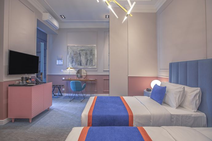 Imagen de la habitación del Hotel Heritage and Suites. Foto 2