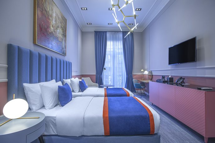 Imagen de la habitación del Hotel Heritage and Suites. Foto 4
