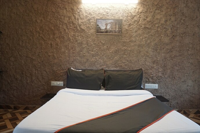 Imagen de la habitación del Hotel Heritage inn, Vadgaon. Foto 17