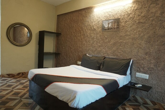 Imagen de la habitación del Hotel Heritage inn, Vadgaon. Foto 20