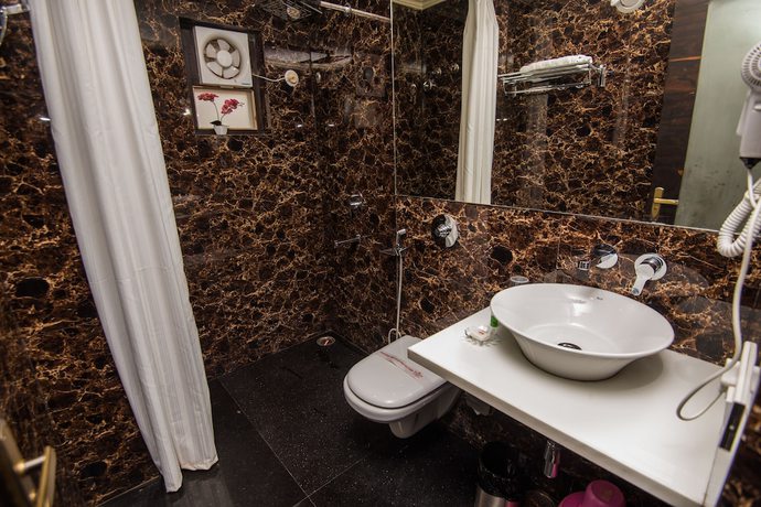 Imagen de la habitación del Hotel Heritage inn, Varanasi. Foto 5