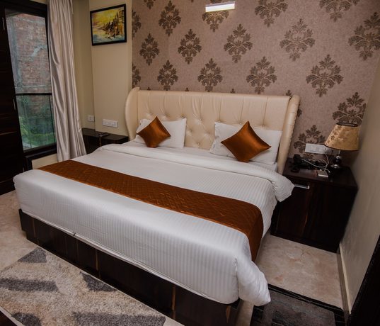 Imagen de la habitación del Hotel Heritage inn, Varanasi. Foto 6