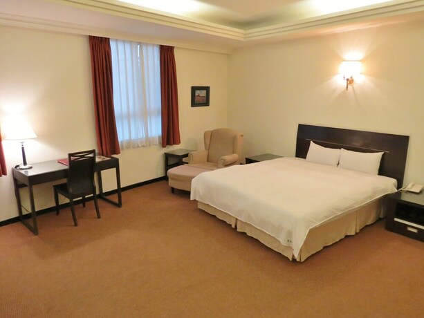 Imagen de la habitación del Hotel Herkang. Foto 2