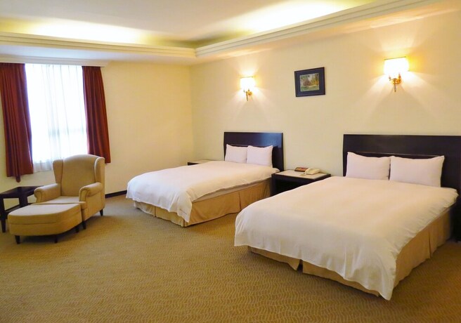 Imagen de la habitación del Hotel Herkang. Foto 3