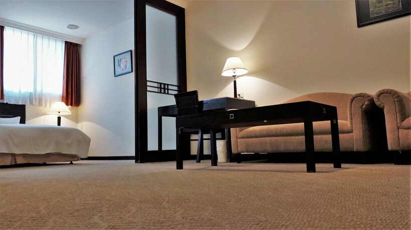 Imagen de la habitación del Hotel Herkang. Foto 5