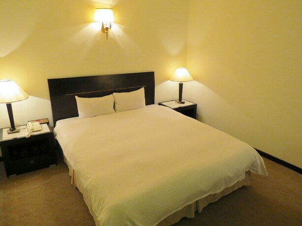 Imagen de la habitación del Hotel Herkang. Foto 10