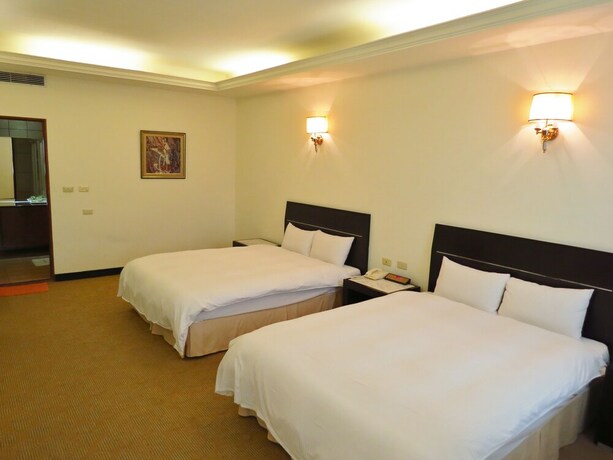 Imagen de la habitación del Hotel Herkang. Foto 12