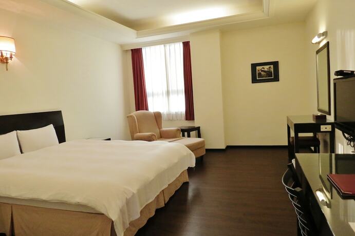 Imagen de la habitación del Hotel Herkang. Foto 15