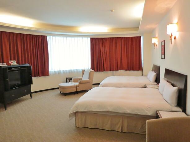 Imagen de la habitación del Hotel Herkang. Foto 16