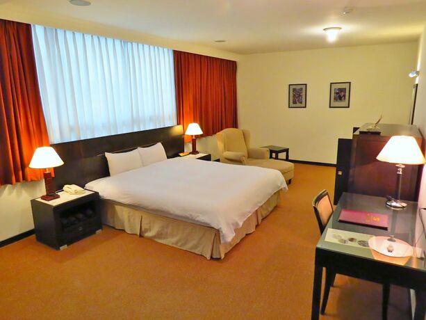 Imagen de la habitación del Hotel Herkang. Foto 17