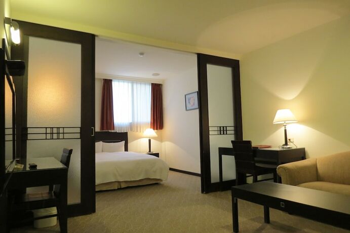 Imagen de la habitación del Hotel Herkang. Foto 18