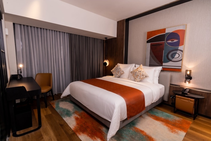 Imagen de la habitación del Hotel Herloom and Residence BSD Tangerang. Foto 2