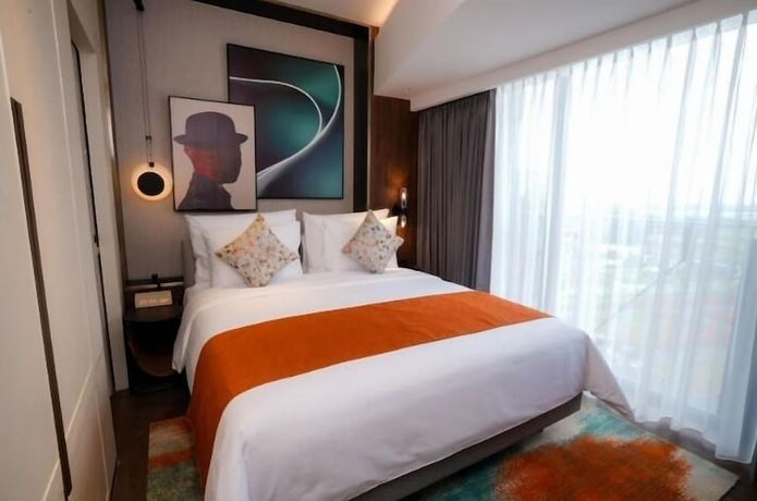 Imagen de la habitación del Hotel Herloom and Residence BSD Tangerang. Foto 6