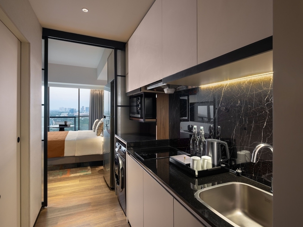 Imagen de la habitación del Hotel Herloom and Residence BSD Tangerang. Foto 17