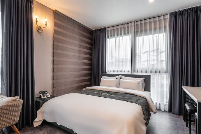 Imagen de la habitación del Hotel Hermes Yongin. Foto 3