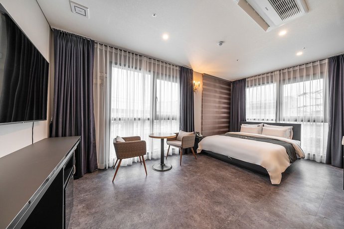 Imagen de la habitación del Hotel Hermes Yongin. Foto 10