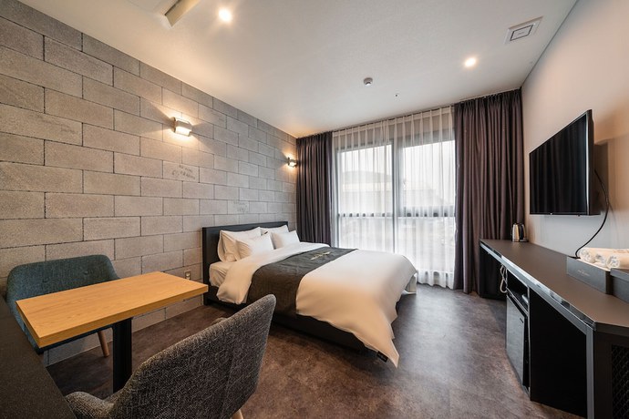 Imagen de la habitación del Hotel Hermes Yongin. Foto 17