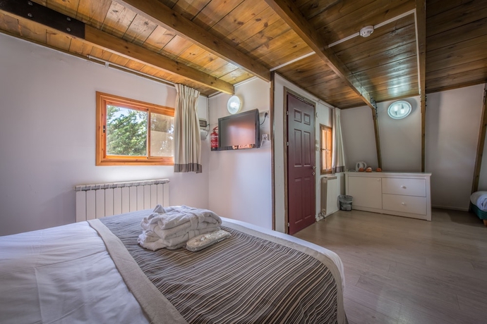 Imagen de la habitación del Hotel Hermon Holiday Village. Foto 12