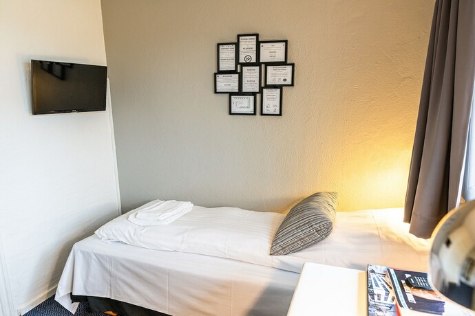 Imagen de la habitación del Hotel Herning. Foto 17