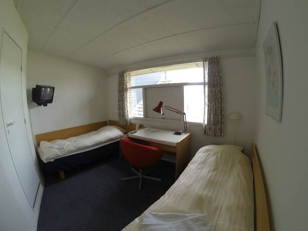 Imagen de la habitación del Hotel Herning. Foto 22