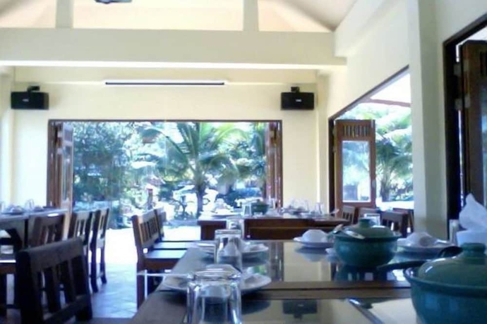 Imagen del bar/restaurante del Hotel Herntai Resort. Foto 5