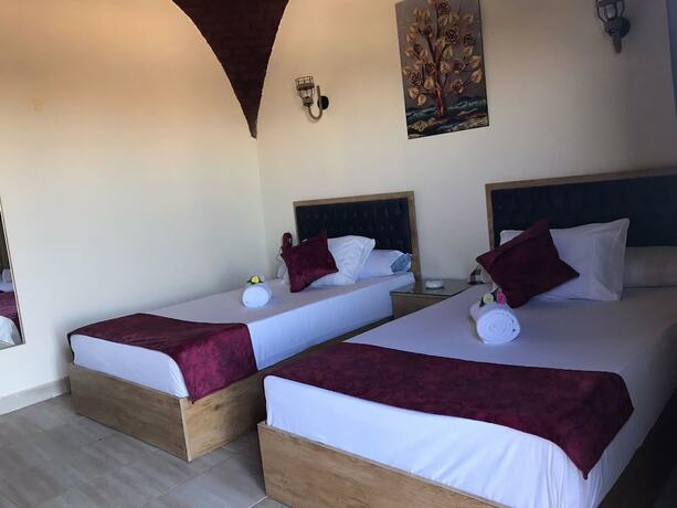 Imagen de la habitación del Hotel Heru Pyramids View. Foto 15