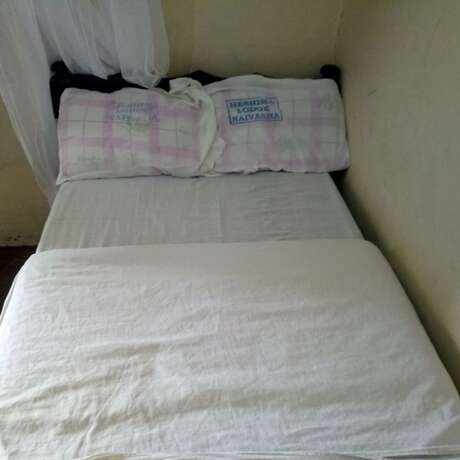 Imagen de la habitación del Hotel Heshima Lodge. Foto 11