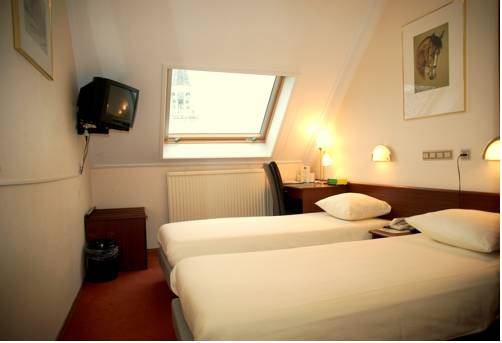 Imagen de la habitación del Hotel Het Wapen Van Leiden. Foto 3