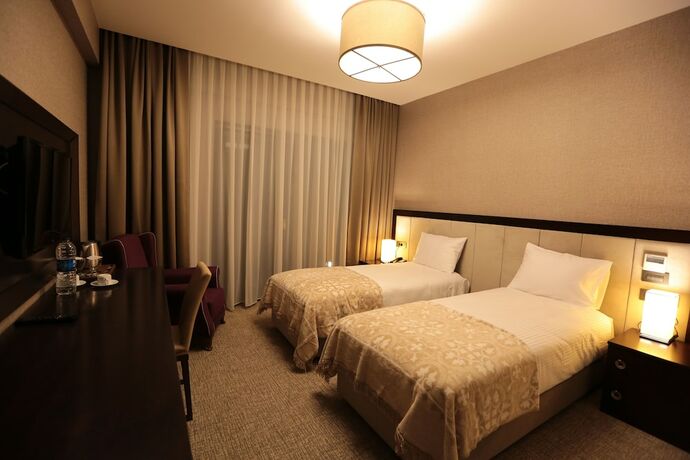 Imagen de la habitación del Hotel Heybeli Otel Bursa. Foto 11
